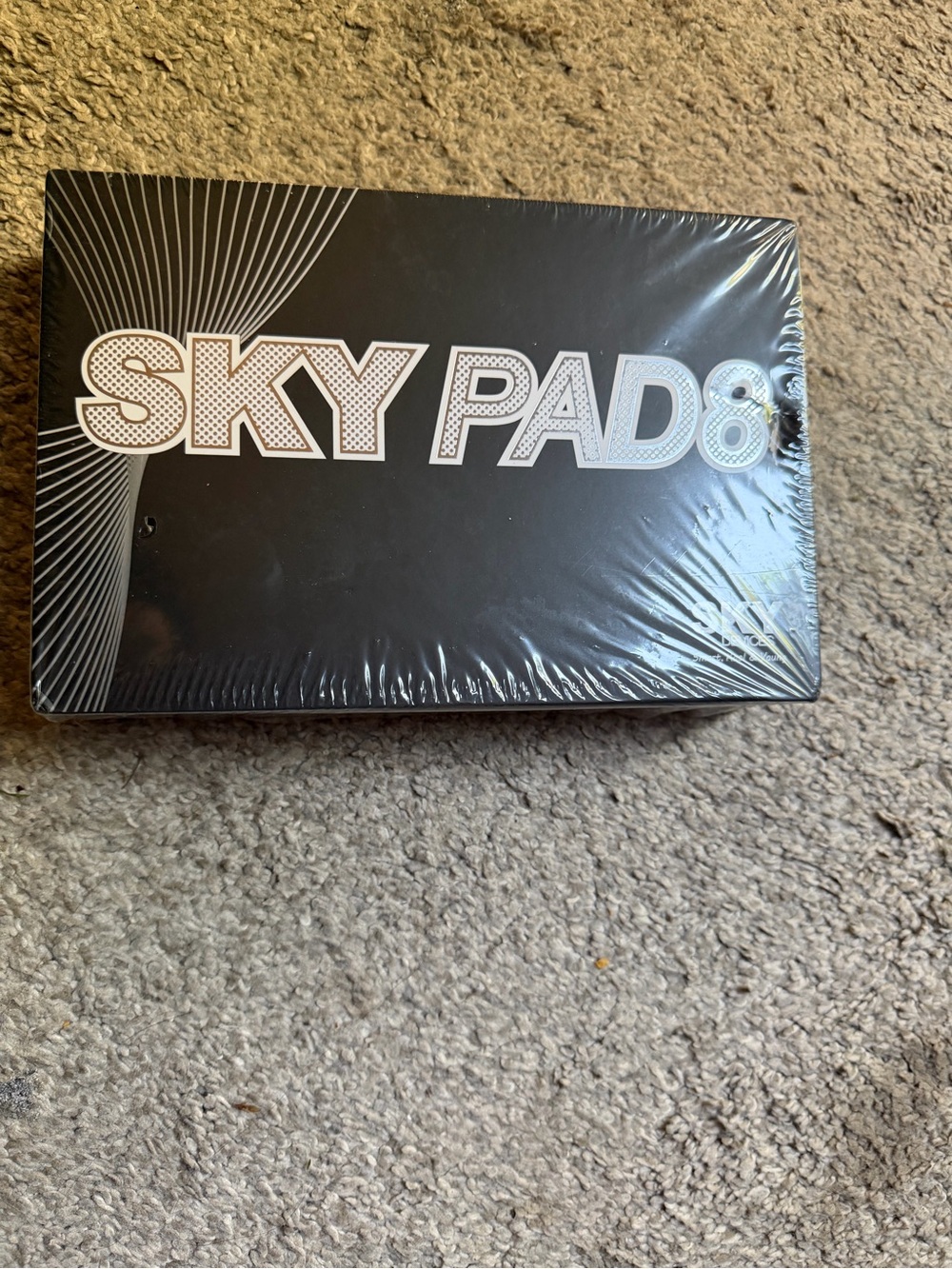 Sky Pad 8 Black Packaging with White Logo